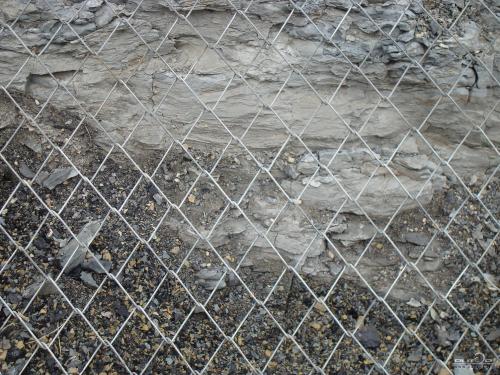 This type of fence is usually square and is called Chain Link Fence