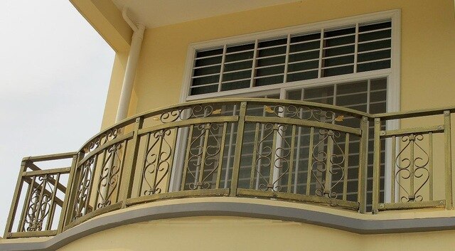 What are the details of the installation of galvanized steel balcony railings?