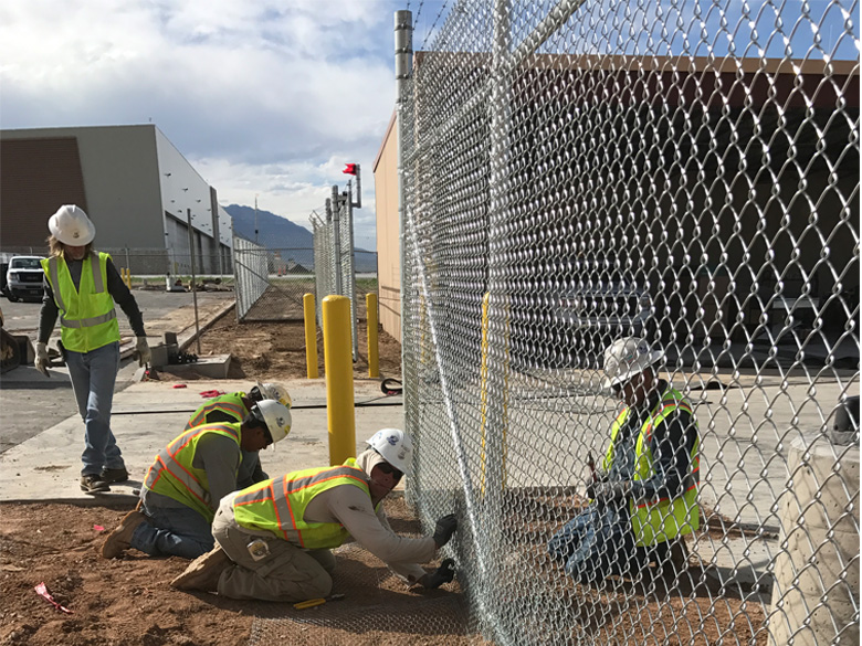 Maintenance of road mesh fence