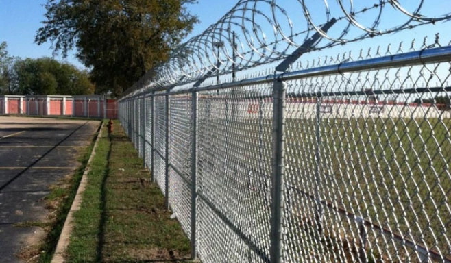 How deep do you need to penetrate the concrete of the chain link fencing column?